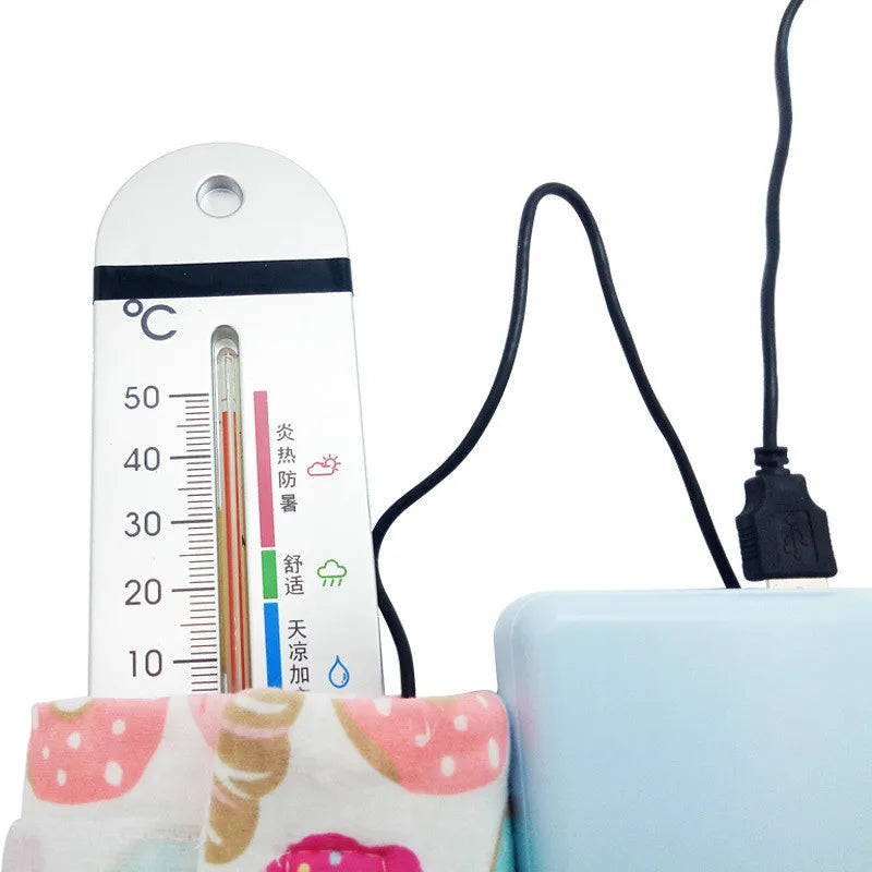 Aquecedor Portátil para Mamadeira – Leite quentinho em qualquer lugar, a qualquer hora